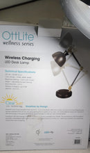 Load image into Gallery viewer, OttLite LED Table Lamp, Black - 3 Brightness levels, Adjustable Knobs, Wireless Charging, Touch Control, USB Port (5V, 2.1A)